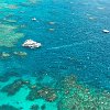 Our boat on the Great Barrier Reef, taken from the helicopter.  Note the floating helipad to the right